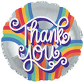 The CTI 18" Thank You Rainbow Foil Balloon is round and silver, displaying “Thank you” in bold white script over radiant rainbow stripes—an eye-catching appreciation gift.
