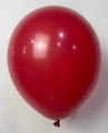 A 36" Standard Dynasty Red Decomex Latex Balloon (by Decomex), inflated and tied at the bottom, floats against a plain white background.