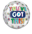 Le ballon de 16" Orbz Clear You've Got This ! d'Anagram/MD comporte un lettrage coloré "YOU'VE GOT THIS !" sur un fond blanc avec des éclats d'étoiles multicolores.