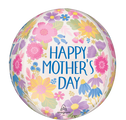 Le ballon à bulles Orbz de 16" de Anagram/MD représente des motifs floraux colorés et "Joyeuse Fête des Mères" en bleu sur fond blanc.