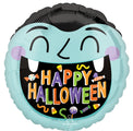 Le ballon de 18 pouces d'Anagram/MD représente une forme ronde avec un visage de vampire, des crocs, des joues rougissantes, "HAPPY HALLOWEEN" en lettres colorées, et des bonbons d'Halloween autour du texte.