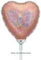 A holographic rose gold heart-shaped foil balloon (9", airfill only with self-sealing valve) by Oaktree is shown. Balloon cup and stick are not included. Comes in packs of 5.