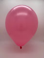 A single inflated 12″ Kalisan Latex Heart Balloon in Queen Pink floats against a plain, light grey background.