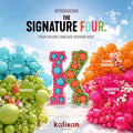 A balloon display forms the letter K with aqua, matcha, flame orange, and magenta pink. Featuring Kalisan 5" Latex Balloons in Flame Orange. Introducing the Signature Four: four colors, endless possibilities.