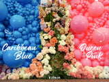 A floral arrangement stands between clusters of blue and pink balloons, with the pink ones labeled as 12″ Kalisan Latex Heart Balloons Standard Queen Pink (25 Per Bag), featuring the Kalisan brand name at the bottom.