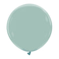 A fully inflated, large, round 24″ Cattex Brand Premium Vintage Blue Latex Balloon is floating against a plain white background.