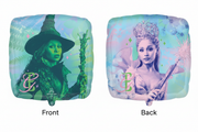 The 17" Standard Wicked: For Good Foil Balloon by Anagram/MD features a green witch with hat and staff on one side, and a sparkling fairy with crown and wand on the other.